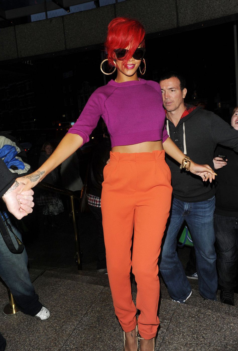 Rihanna arrives at Kiss FM Studios in a colorful outfit to match her hairstyle