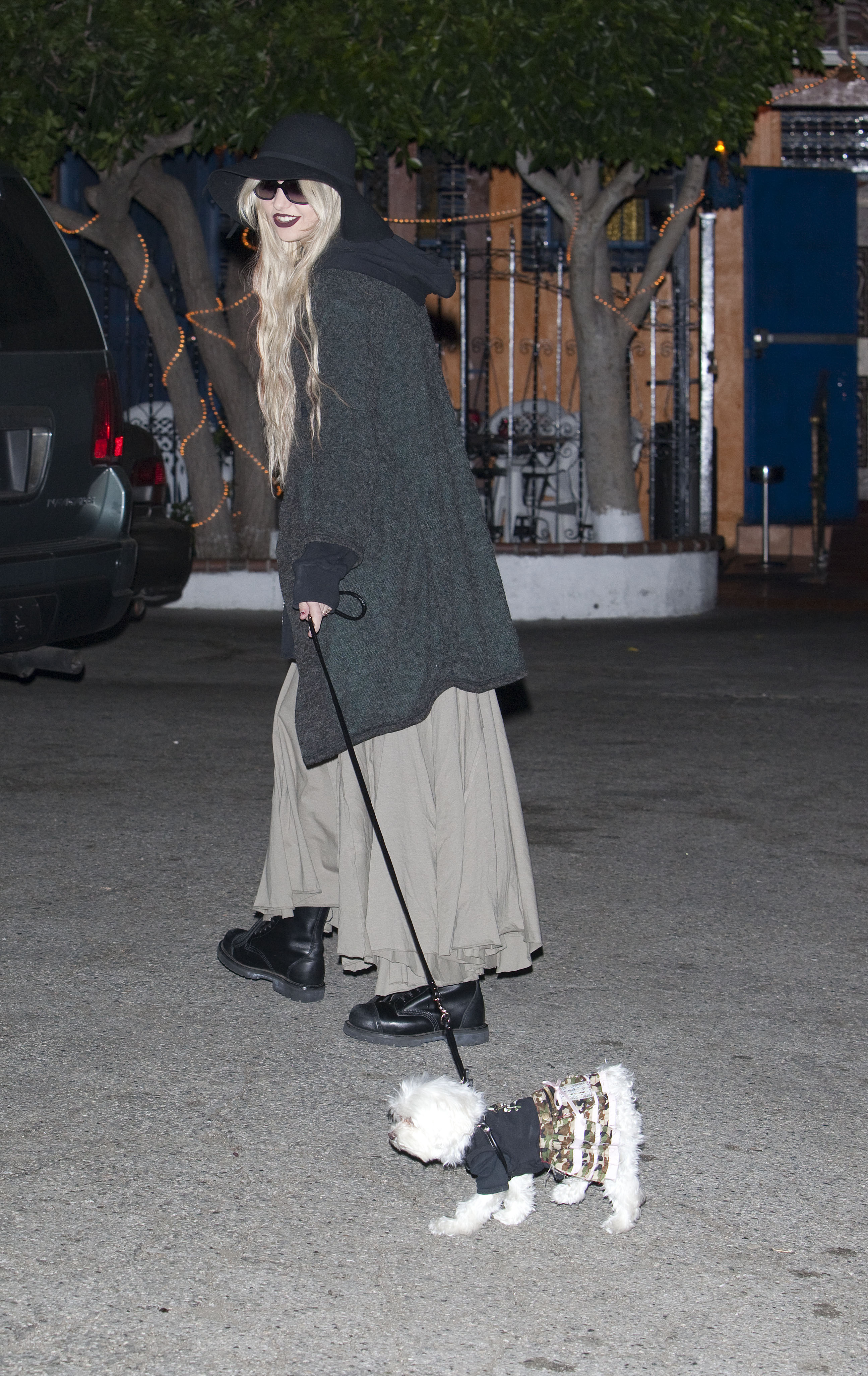 Taylor Momsen and her puppy leave El Compadre Mexican Restaurant on Sunset Blvd in Hollywood