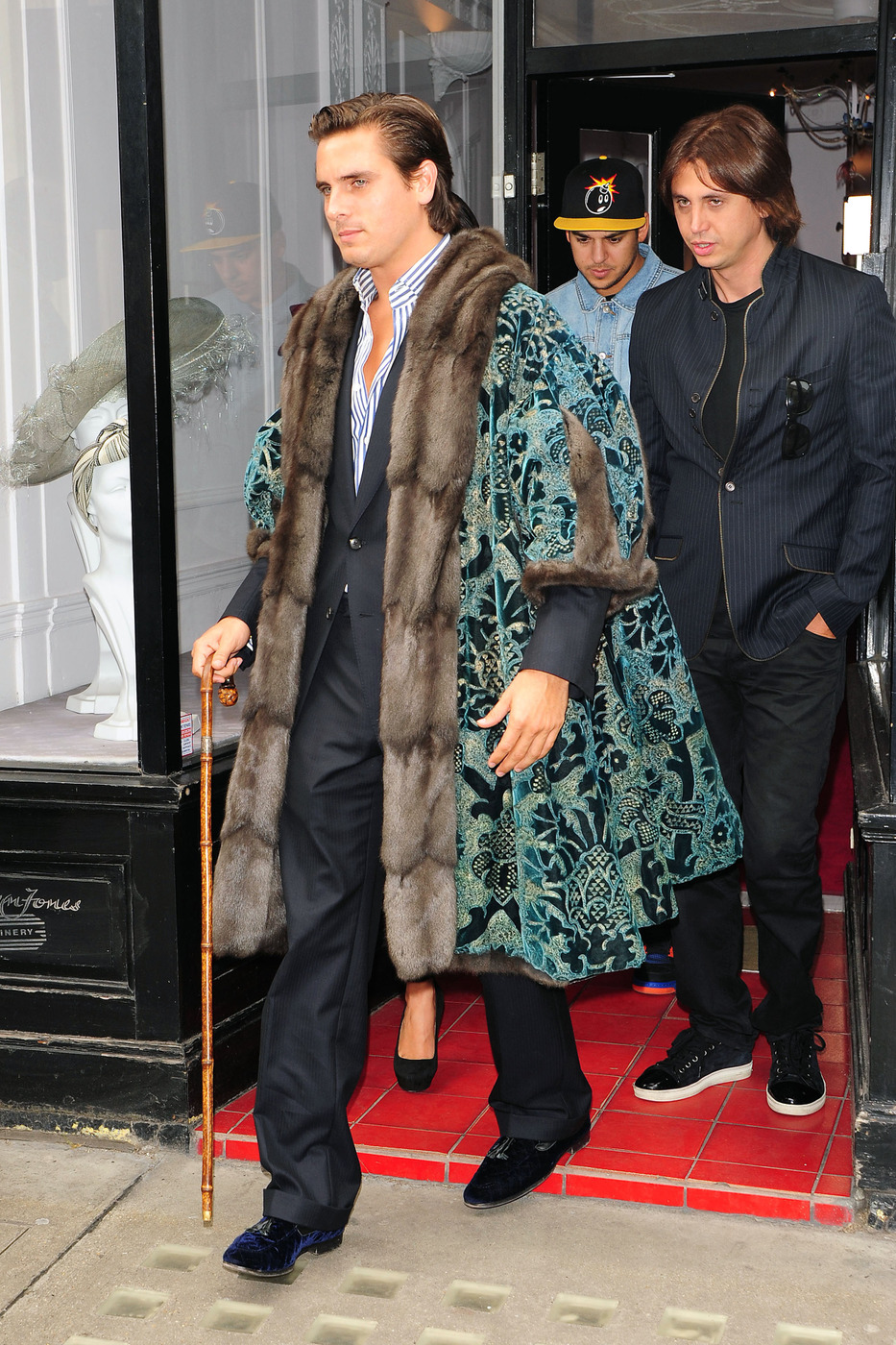 Rob Kardashian and Scott Disick, wearing a unique, fur lined, patterned coat, film scenes for 'Keeping Up with the Kardashians' whilst shopping in London