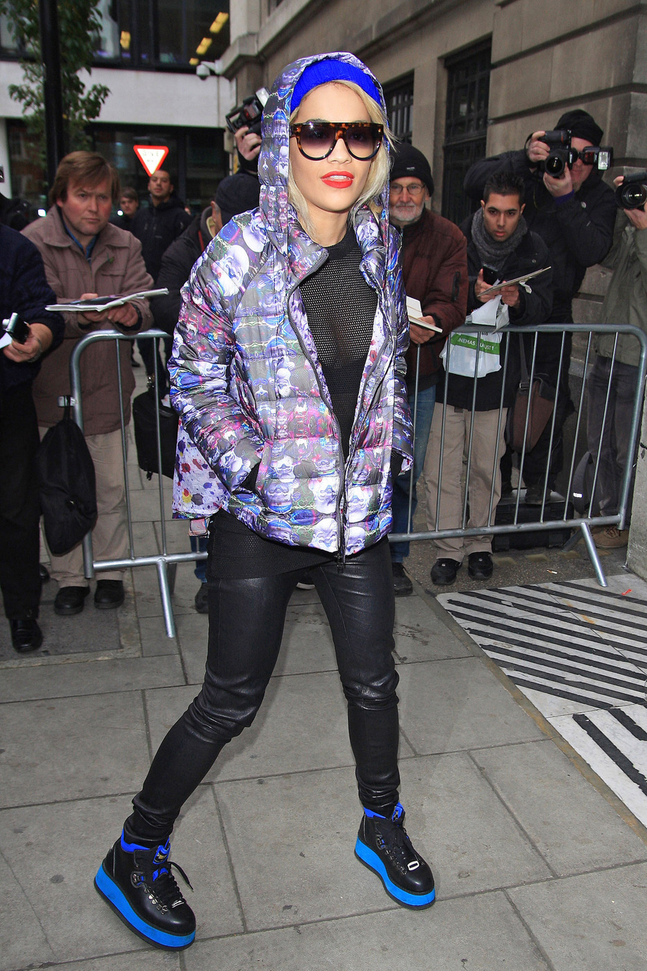 Rita Ora, wearing a very revealing see-through mesh top and black leather pants, makes her way into the BBC Radio 2 studios in London