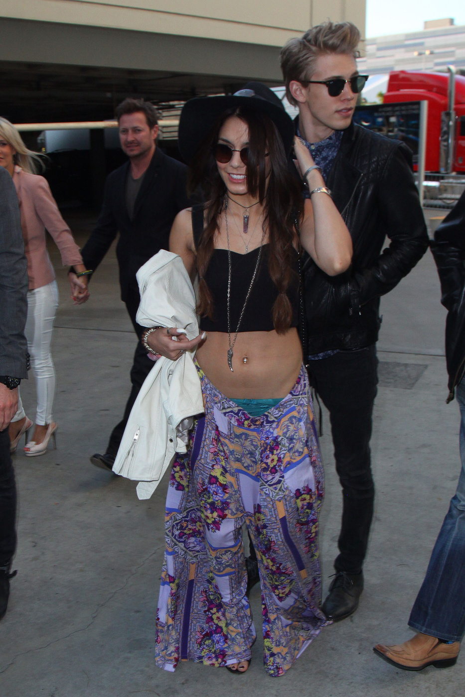 Vanessa Hudgens suffers a wardrobe malfunction as she arrives at the Rolling Stones concert with Austin Butler at the Staples Center in Los Angeles
