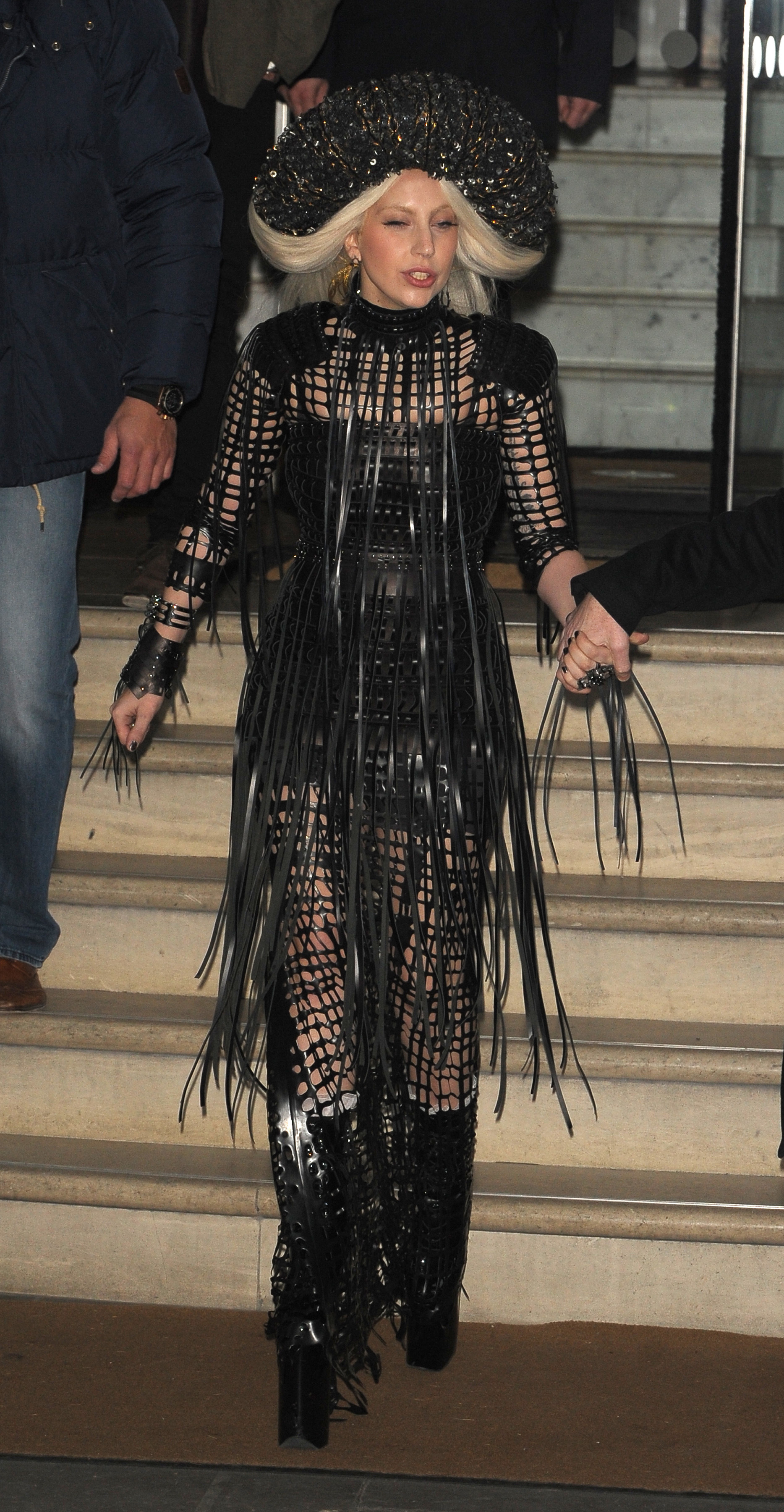 Lady Gaga leaves her hotel with Philip Treacy