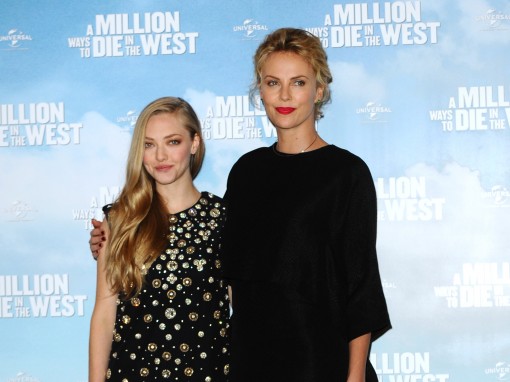 Well Played, Amanda Seyfried (in Alexander McQueen ) and Charlize Theron (in Stella McCartney)