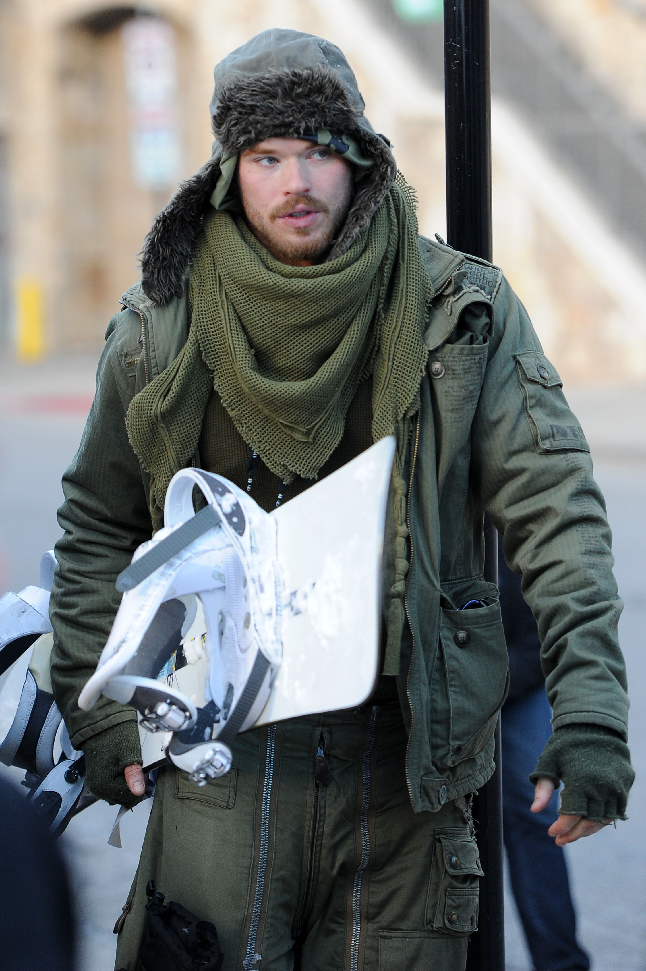 Kellan Lutz wipes his nose after hitting the slopes snowboarding and is spotted with a mystery woman in Park City, Utah