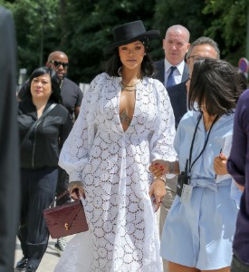 Rihanna flashes some cleavage while in Paris!