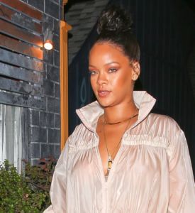 Rihanna keeps it covered up in Puma