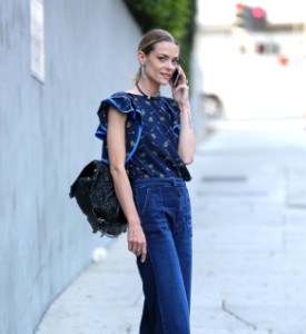 *EXCLUSIVE* Jaime King chats on her Hillary Clinton smart phone case before heading inside BOA steak house