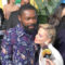 Charlize Theron, Channeling Us All, Tenderly Clutches David Oyelowo