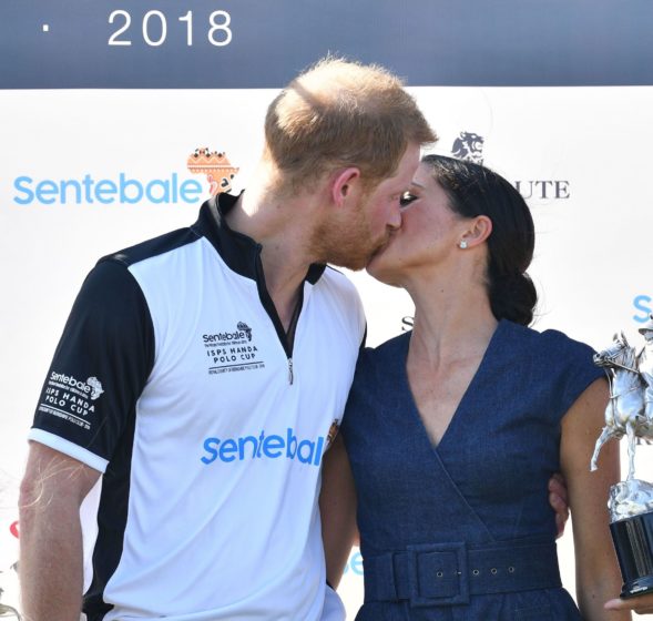 Harry Meghan Polo Carolina Herrera Kissing