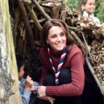 Kate Climbs Into Piles of Leaves With Children