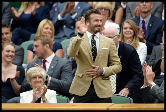 David Beckham with his mother Sandra (L) in the royal box on centre court on day six of the Wimbledon Lawn Tennis Championships at the All England Lawn Tennis and Croquet Club at Wimbledon in London