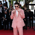 Today&#8217;s Dispatch From Cannes Brings Dramatic Capes, a Great Suit, and VERY Big Hair