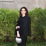 Anne Hathaway Brought Her Biggest Hair to Milan