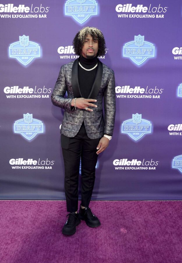 Garrett Wilson Joins the Jets in Prada & Pearls at NFL Draft 2022 –  Footwear News