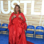Queen Latifah Takes a Turn With the Cult Robe Trend