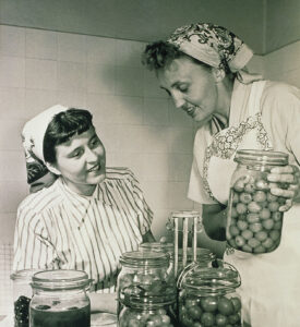 Two Women Canning Fruit in the 1950s