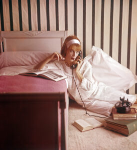 A girl in pyjamas at the telephone