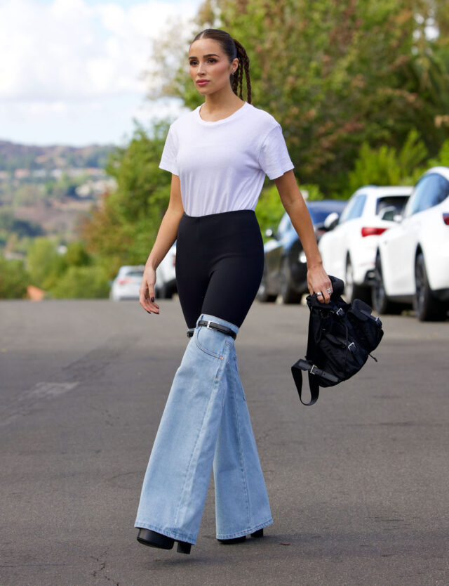EXCLUSIVE - Olivia Culpo Models Coperni's Denim Hybrid Flared Knee High Pants as She Meets Up with Her Sisters to Film Interview, Los Angeles, California, USA - 02 Nov 2022