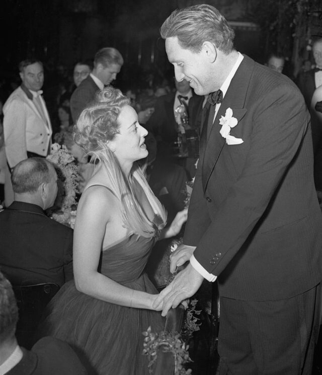 Actress Bette Davis Holding Hands With Actor Spencer Tracy