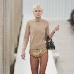 Emma Corrin Closed Miu Miu in Gold Underpants