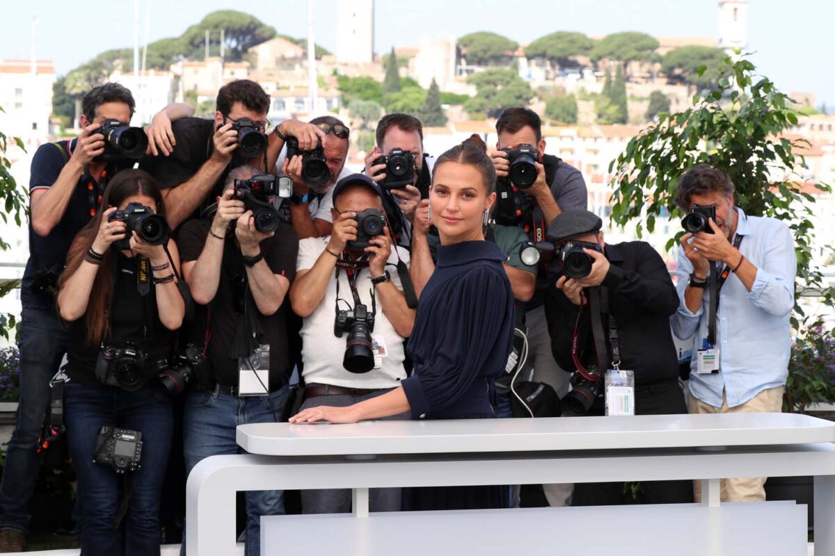 Alicia Vikander wore navy Louis Vuitton dress @ Firebrand Cannes photocall