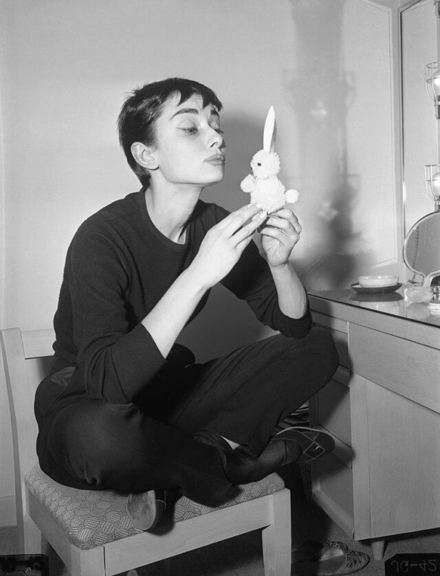 Audrey Hepburn Holding Small Rabbit Charm