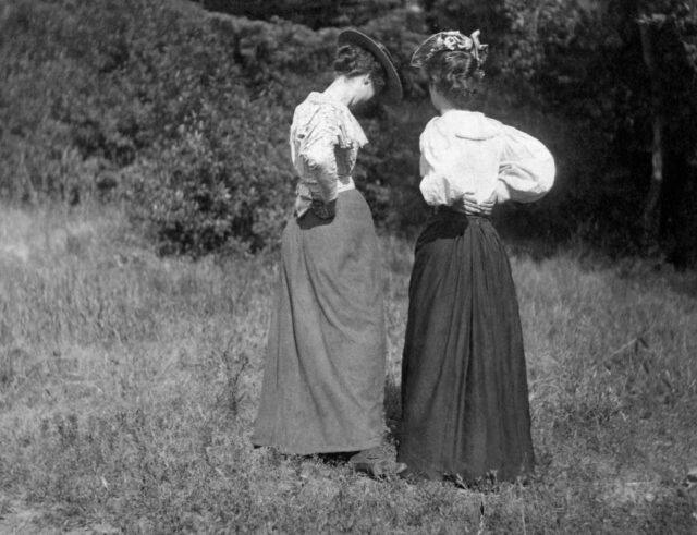 Two Young Women Talking