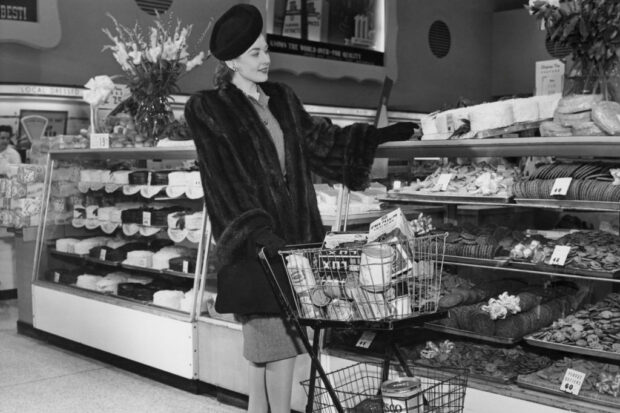 Woman selecting objects in supermarket