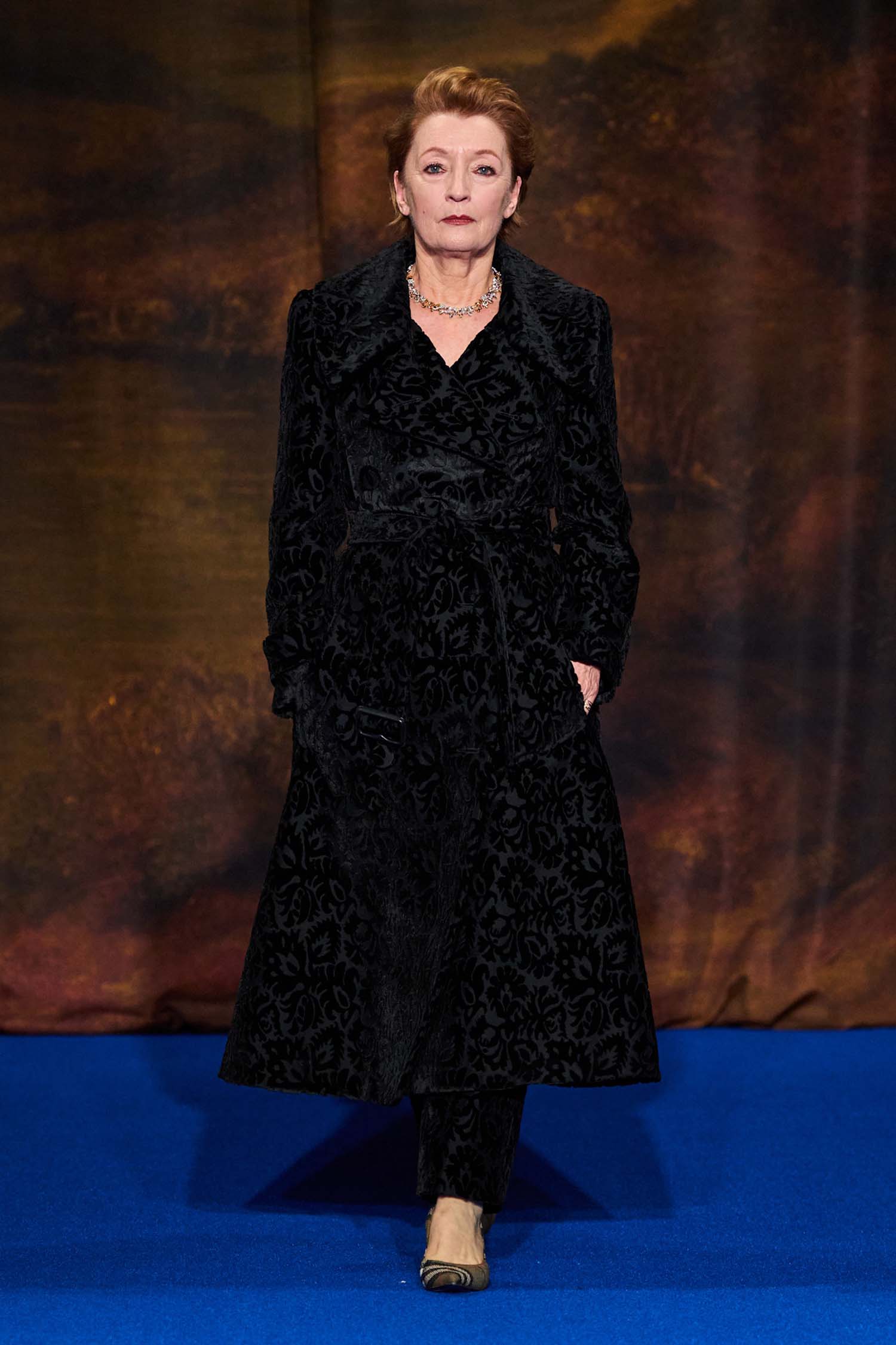 Jason Isaacs and Lesley Manville Walked in Burberry - Go Fug