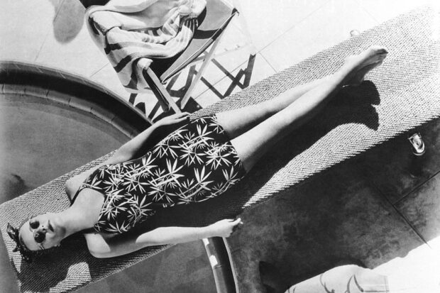 Woman Lying on Diving Board