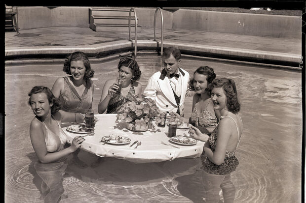 Girls Eating Lunch in Hotel Pool