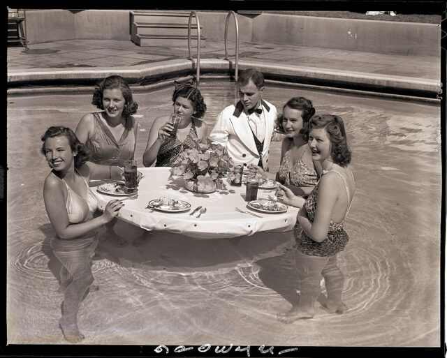 Girls Eating Lunch in Hotel Pool