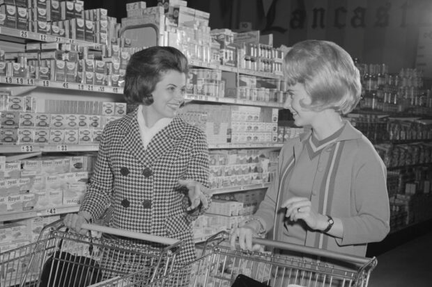 1960s TWO WOMEN TALKING...